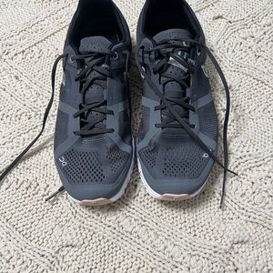 Used about 3 times Women’s 8.5 Gray and Rose Athletic Shoes